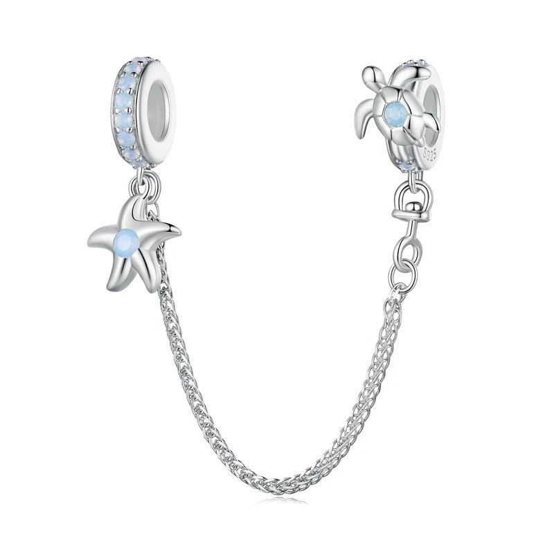 Charm con cadena estrella de mar y tortuga de plata 925