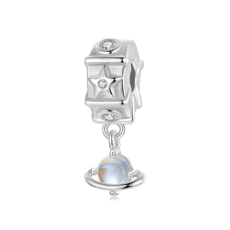 Charm estrellas y planeta de plata 925